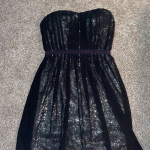Gorgeous black strapless dress. Brand new w/tags